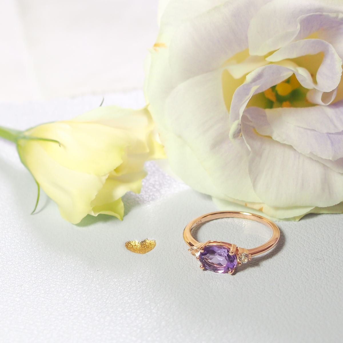 Bague Délicieuse argent doré or rose, améthyste lavande et topaze incolore